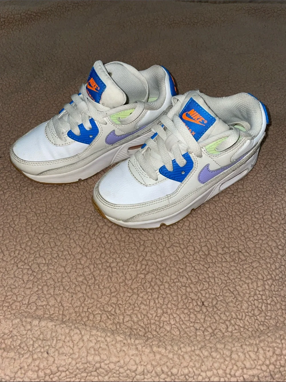 Nike Kids White Sneakers with Purple Swoosh and Blue & Orange Accents